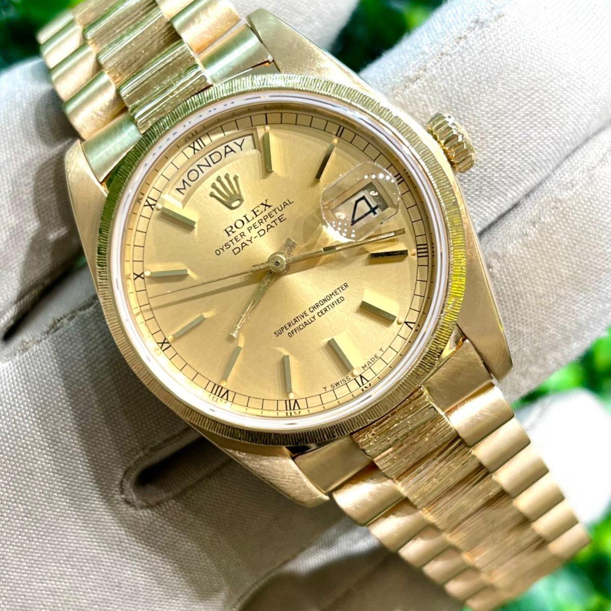 36mm Rolex Day-Date in Solid 18kt Yellow Gold with Champagne Stick Dial, Factory Bark Bezel, and Bark Bracelet (Ref: 18078)(Year: 1984)(Box & Papers)