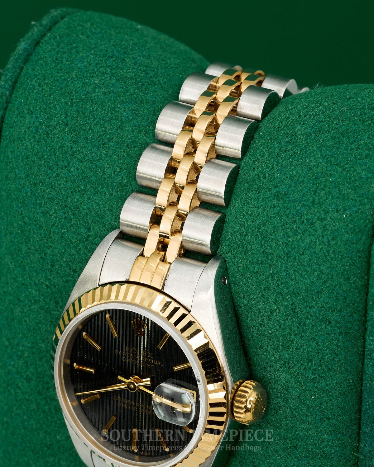 26mm Rolex Datejust with Black Tapestry Stick Dial in 18kt Yellow Gold and Stainless on Jubilee (Ref: 69173)(Year: 1986)