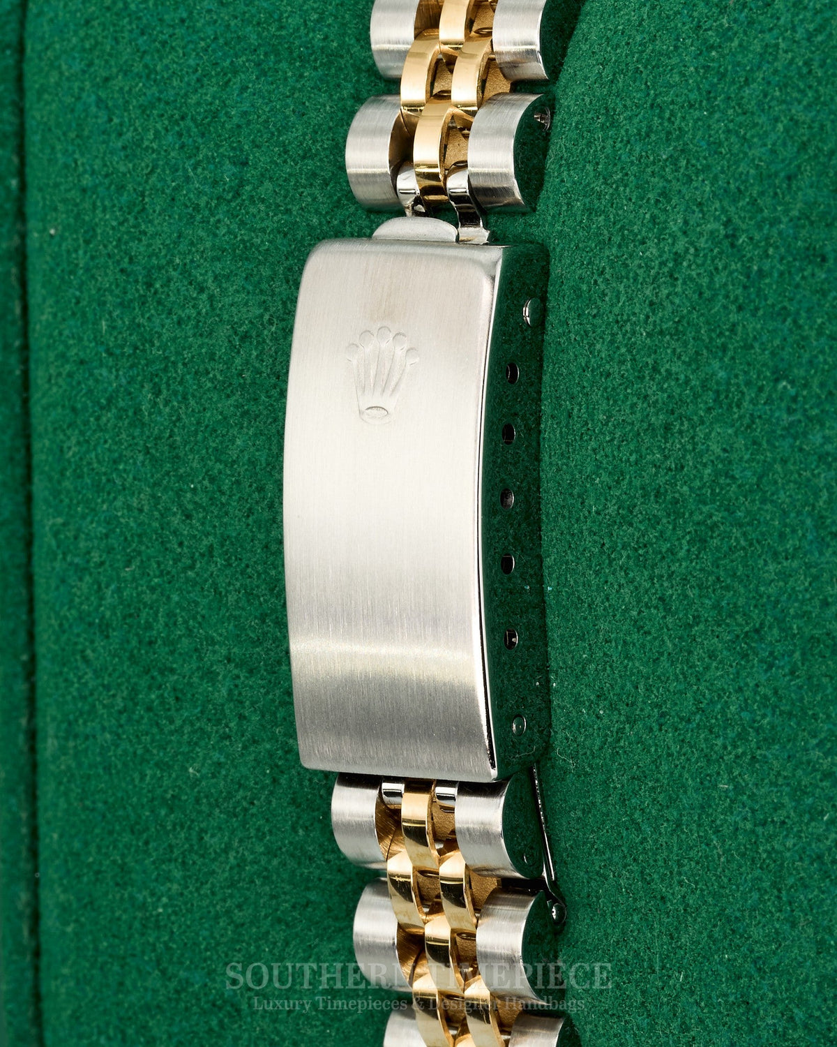 26mm Rolex Datejust with Black Tapestry Stick Dial in 18kt Yellow Gold and Stainless on Jubilee (Ref: 69173)(Year: 1986)