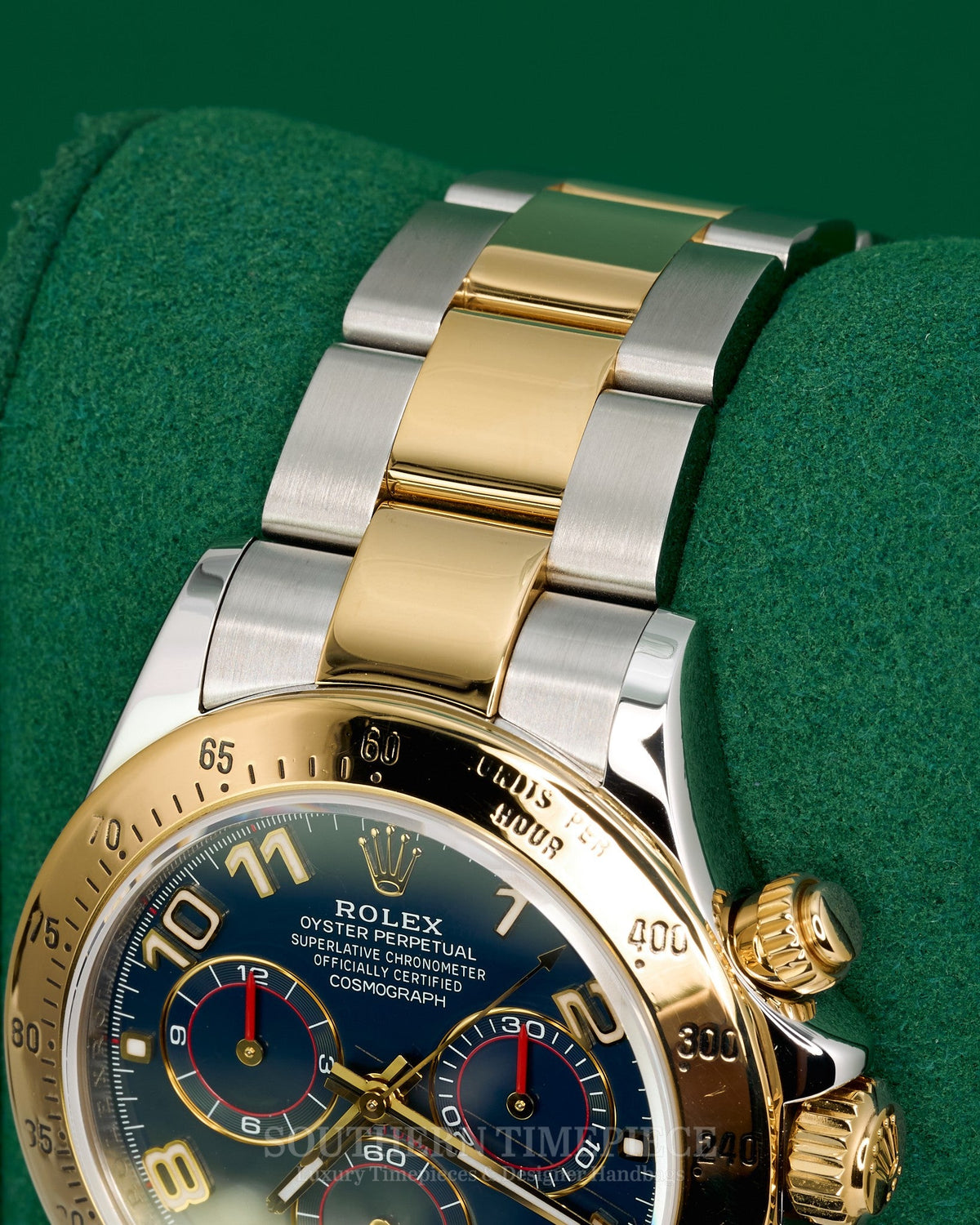 40mm Rolex Daytona with Rare Blue Racing Dial in 18kt Yellow Gold and Stainless on Oyster (Ref: 116523)(Year: 2009)(Box & RSC Card)