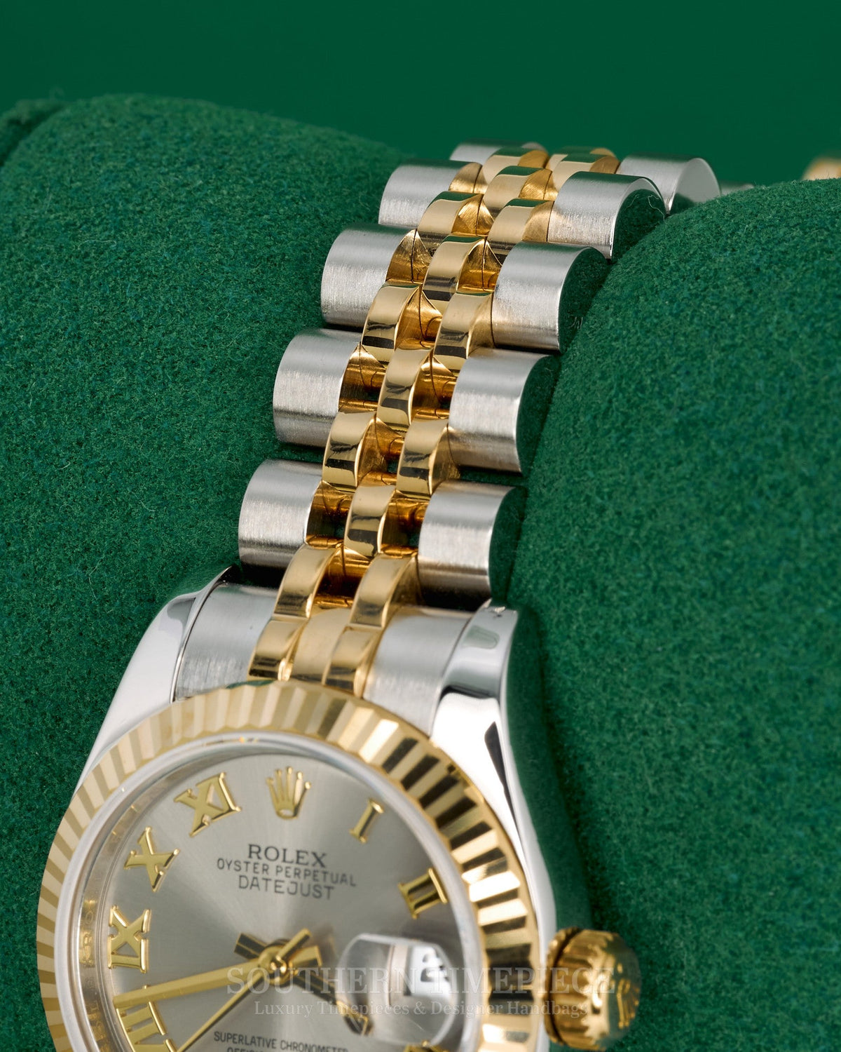 26mm Rolex Datejust with Silver Roman Numeral Dial in 18kt Yellow Gold and Stainless on Jubilee (Ref: 179173)(Year: 2011)