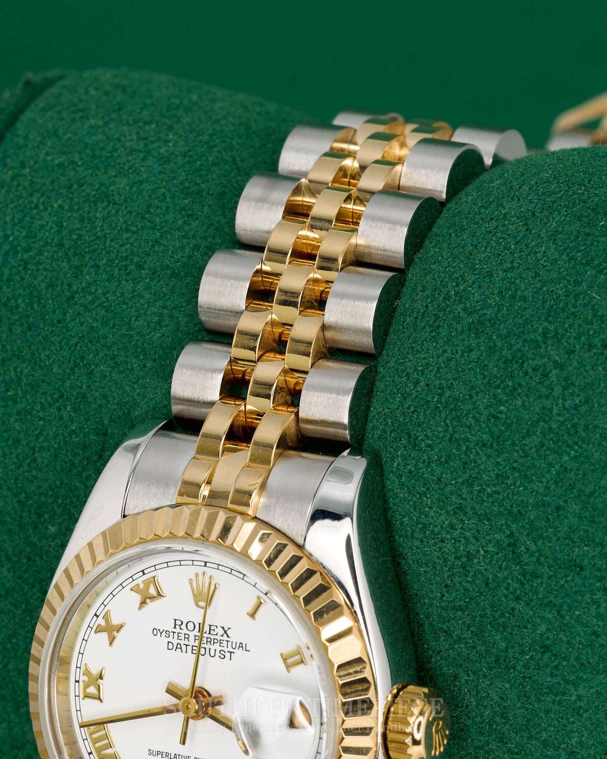 26mm Ladies Rolex Datejust with White Roman Numeral Dial in 18kt Yellow Gold and Stainless on Jubilee (Ref: 179173)(Year: 2005)