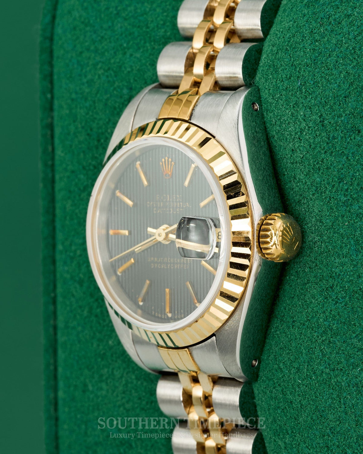 26mm Rolex Datejust with Black Tapestry Stick Dial in 18kt Yellow Gold and Stainless on Jubilee (Ref: 69173)(Year: 1986)