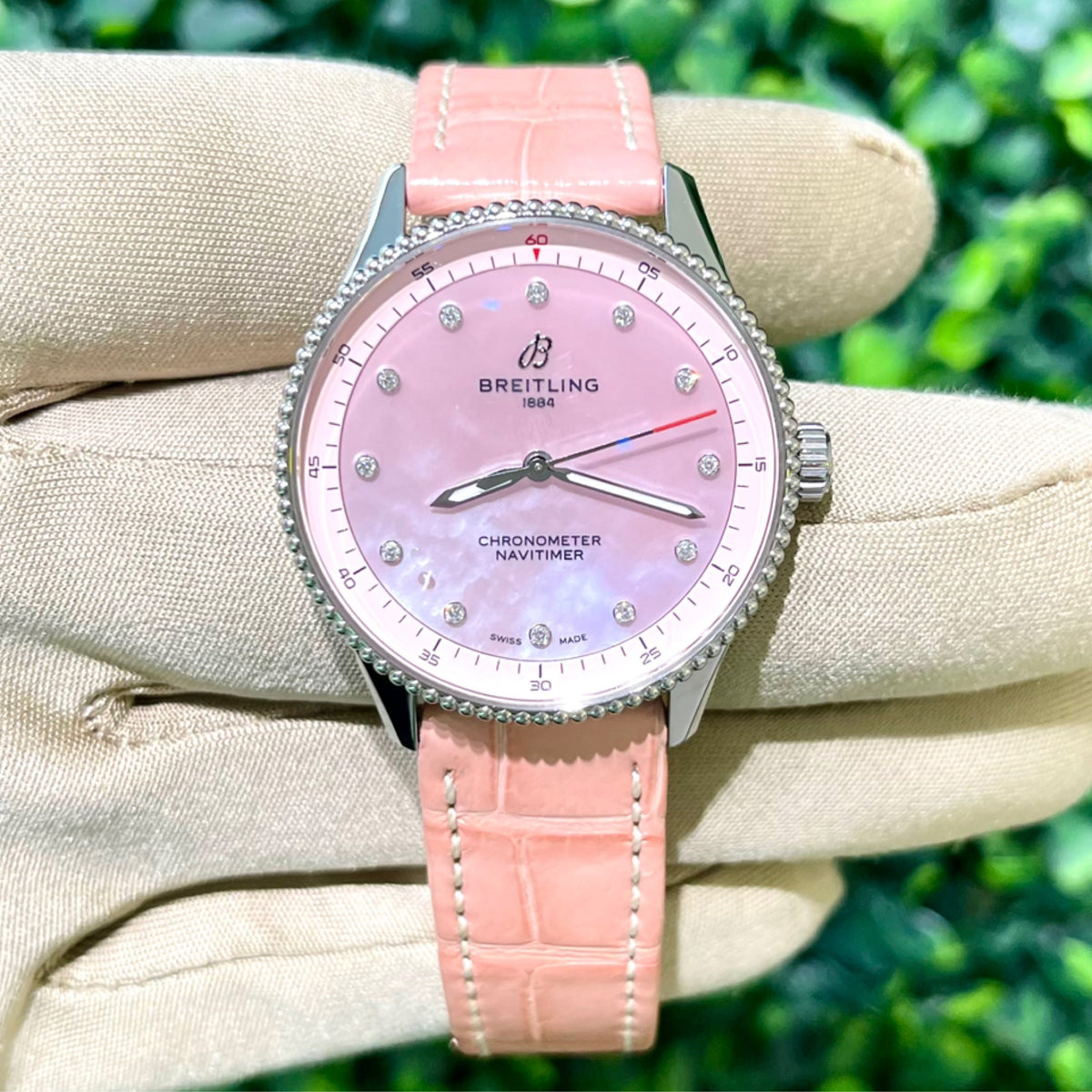 32mm Breitling Navitimer in Stainless with Pink Mother of Pearl Diamond Dial on Pink Crocodile Strap (Ref: A77320)(Year: 2025)(Papers)