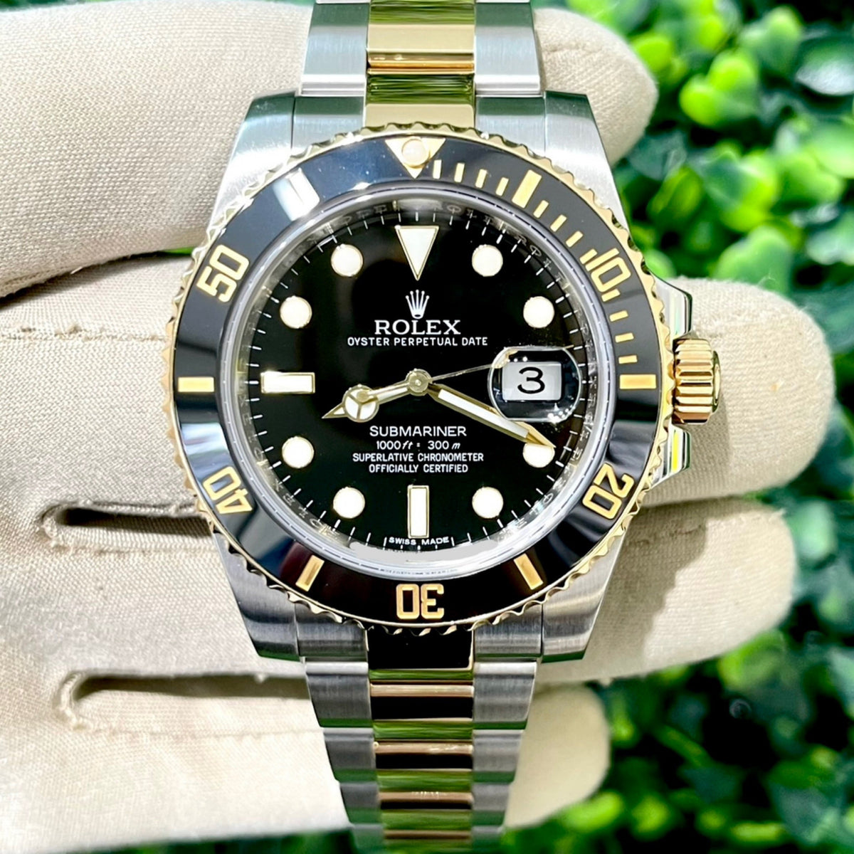 40mm Rolex Submariner in 18kt Yellow Gold and Stainless with Black Dial and Bezel (Ref: 116613LN)(Year: 2009)(Box & Papers)
